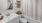 a bathroom with brown and tan linens