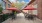 Outdoor patio with red umbrellas