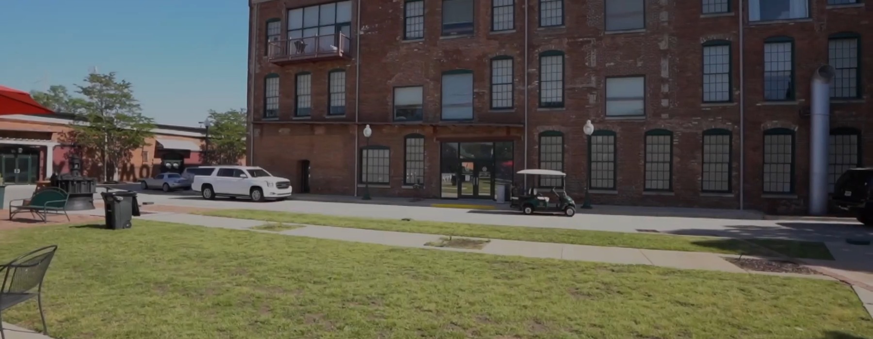 a building with a lawn out front